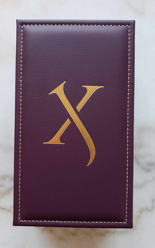Don by Xerjoff comes in a purple leather box with gold stitching around the border and the signature Xerjoff X logo in the middle
