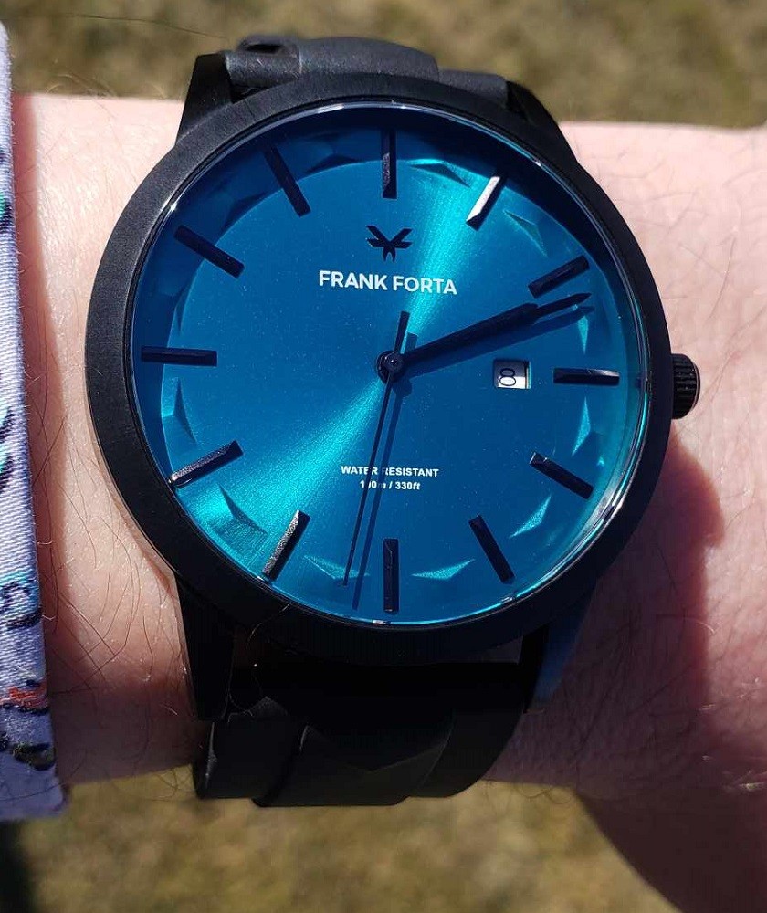 A close-up of the Frank Forta Moraine Lake Turquoise dial. This variant features a very rich, deep blue that shimmers in the sunlight
