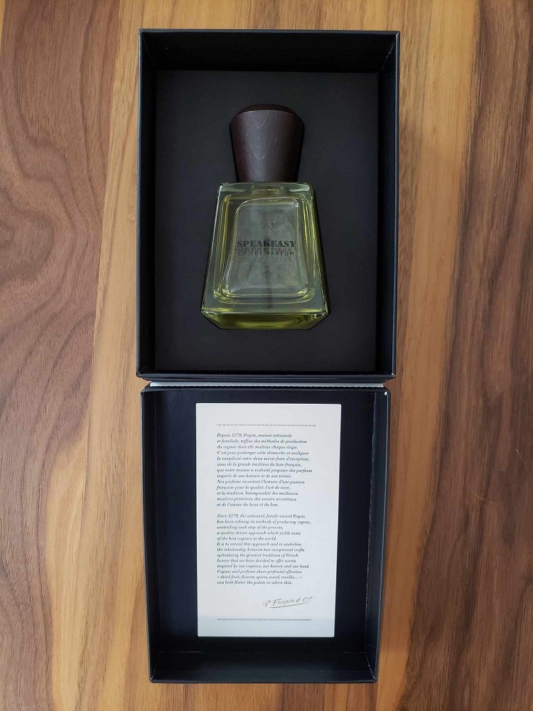 Speakeasy by Frapin is nested in black Styrofoam inside its presentation box