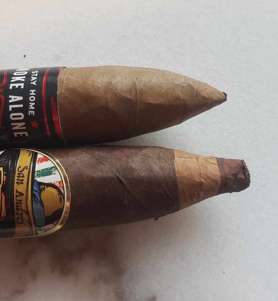 Two figurados are shown. One is more rounded than the other