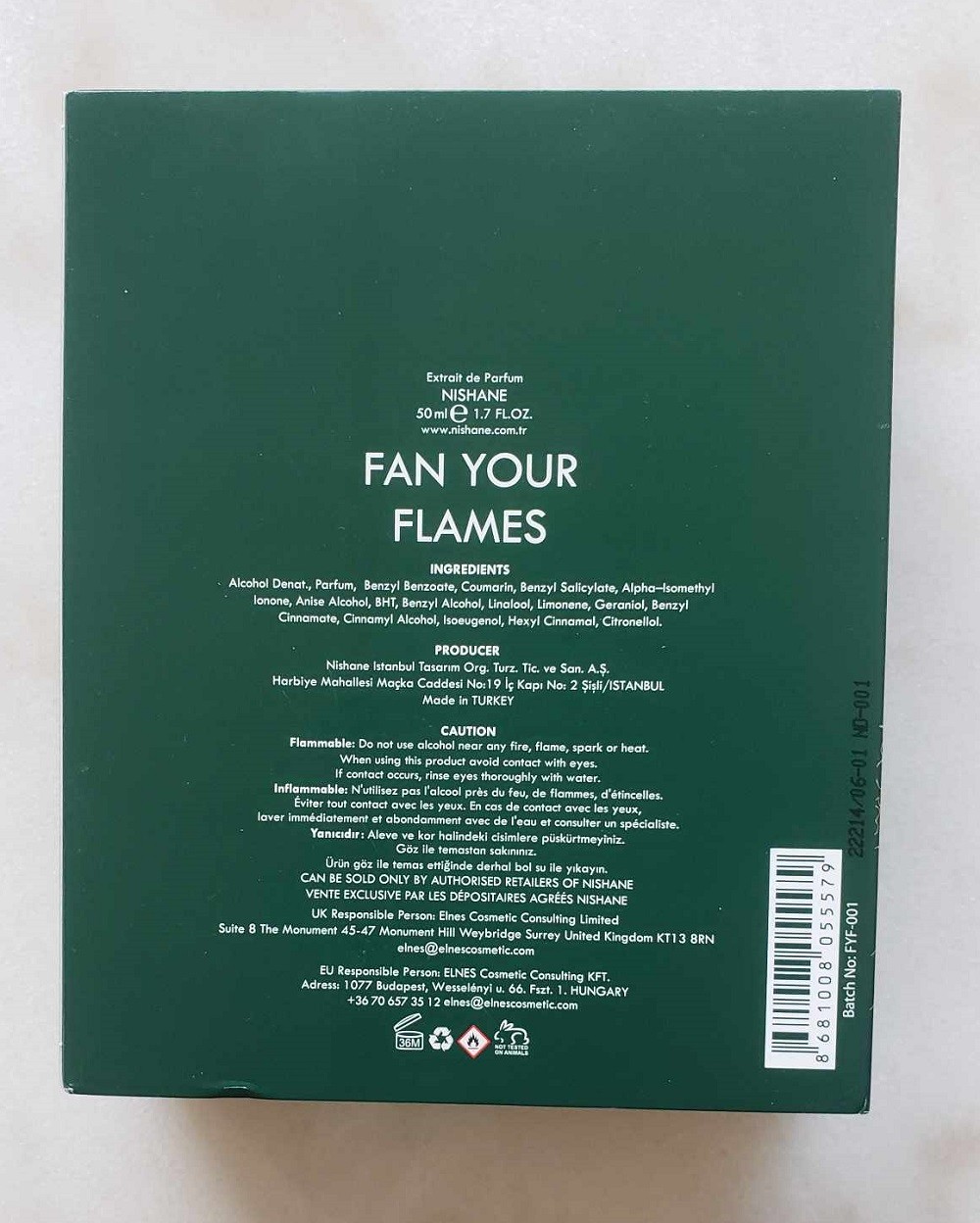 The dark green box of Fan Your Flames by Nishane has all the information including ingredients, address of the fragrance house, and barcode