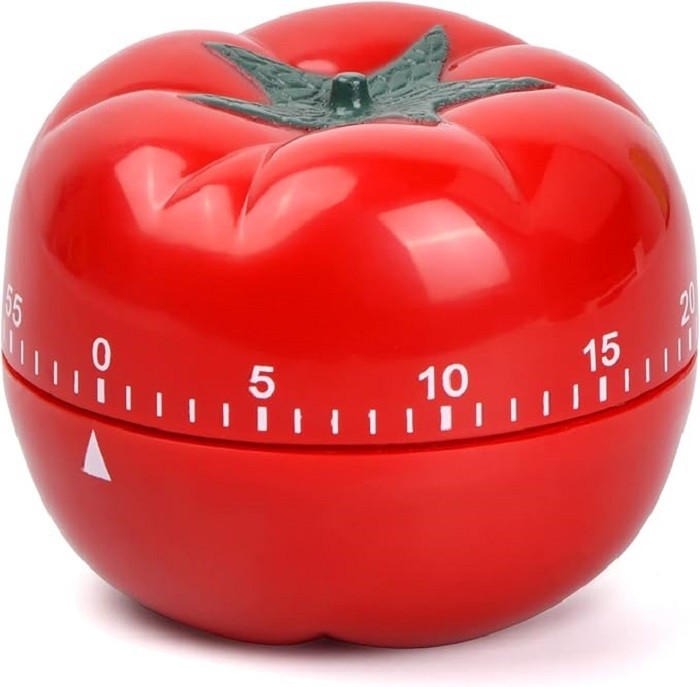 A red tomato-shaped timer with 5 second intervals marked horizontally in the middle