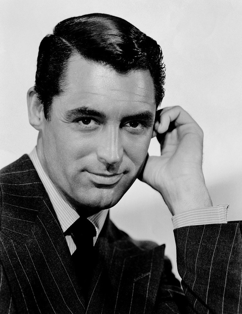 A black and white photograph of Carey Grant