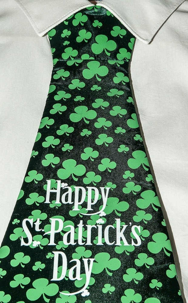 A fat tie is wider than regular ties. This one says 