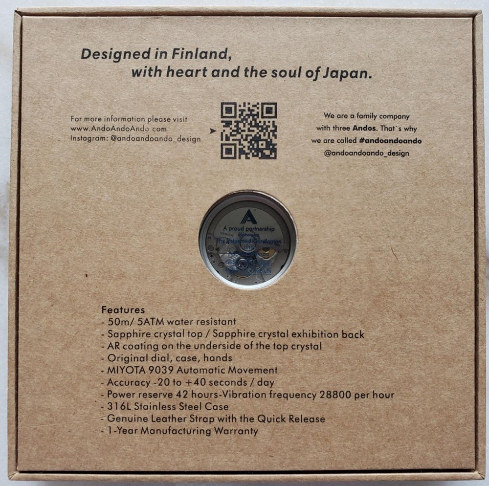 The back of the box that contains the Esteemed Gentleman Vinyl Record Watch by AndoAndoAndo. It displays important information about the watch including the movement, water resistance, and a QR code instruction manual