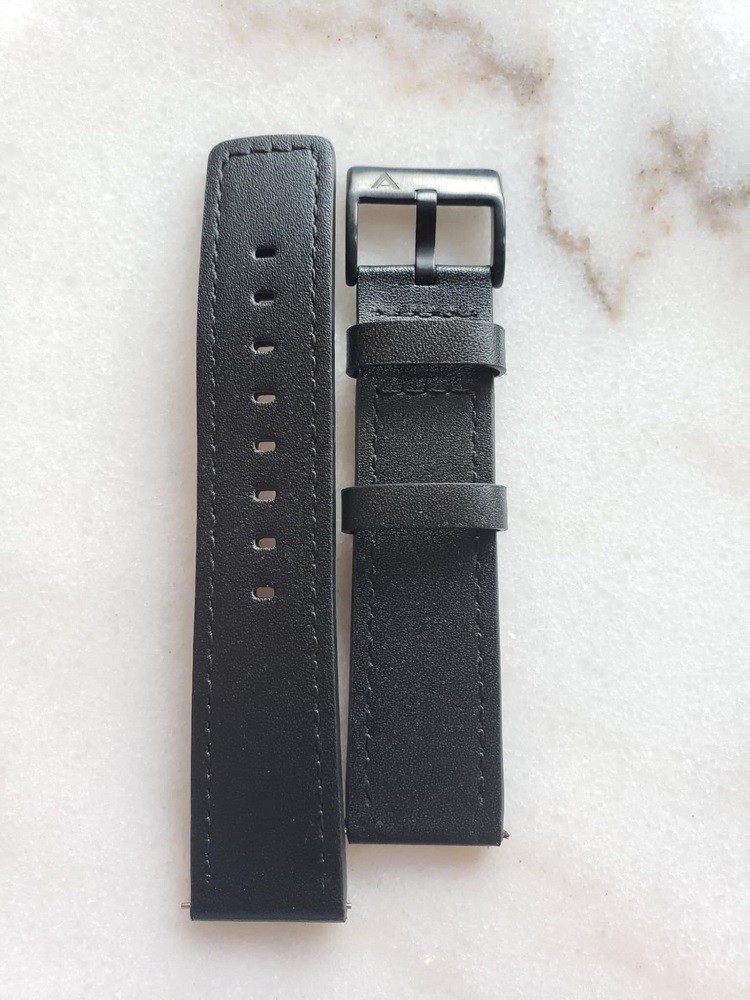 The watch strap for the Esteemed Gentleman vinyl record watch is made of genuine leather. It is black in colour and features black stitching around the entire length of the strap