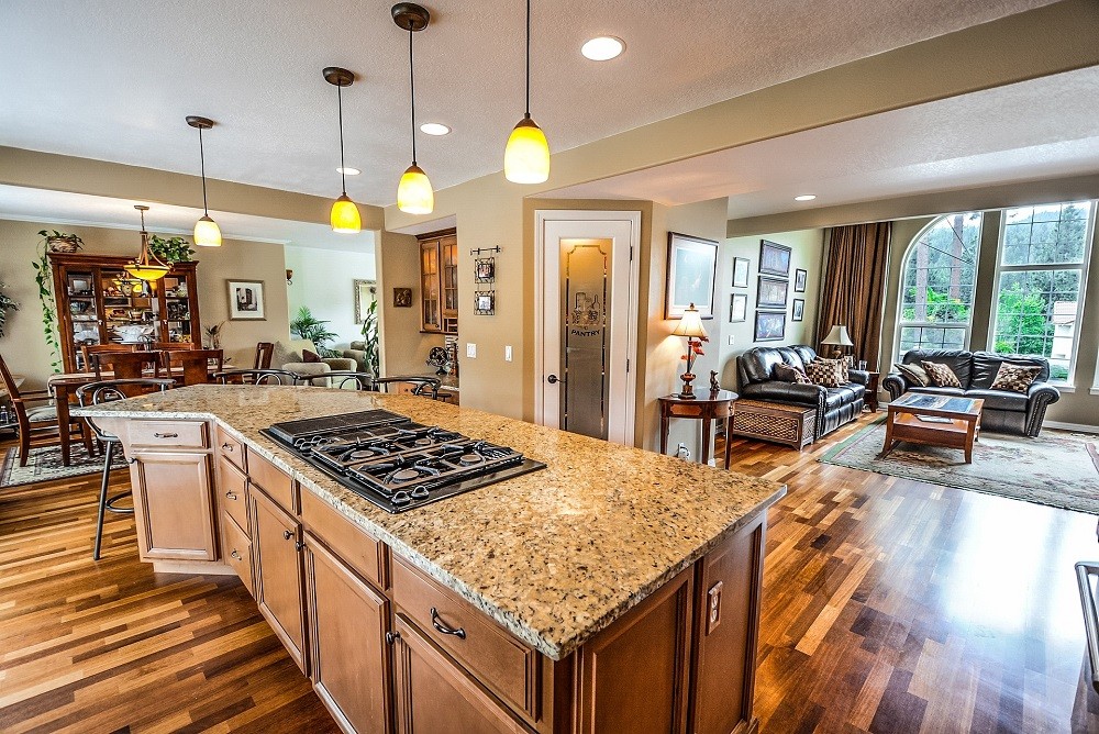 Interior of a home showing off the kitchen and granite countertops