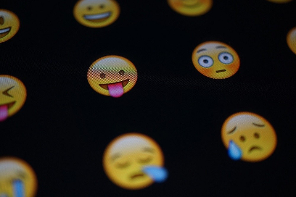 Various emojis on a black background